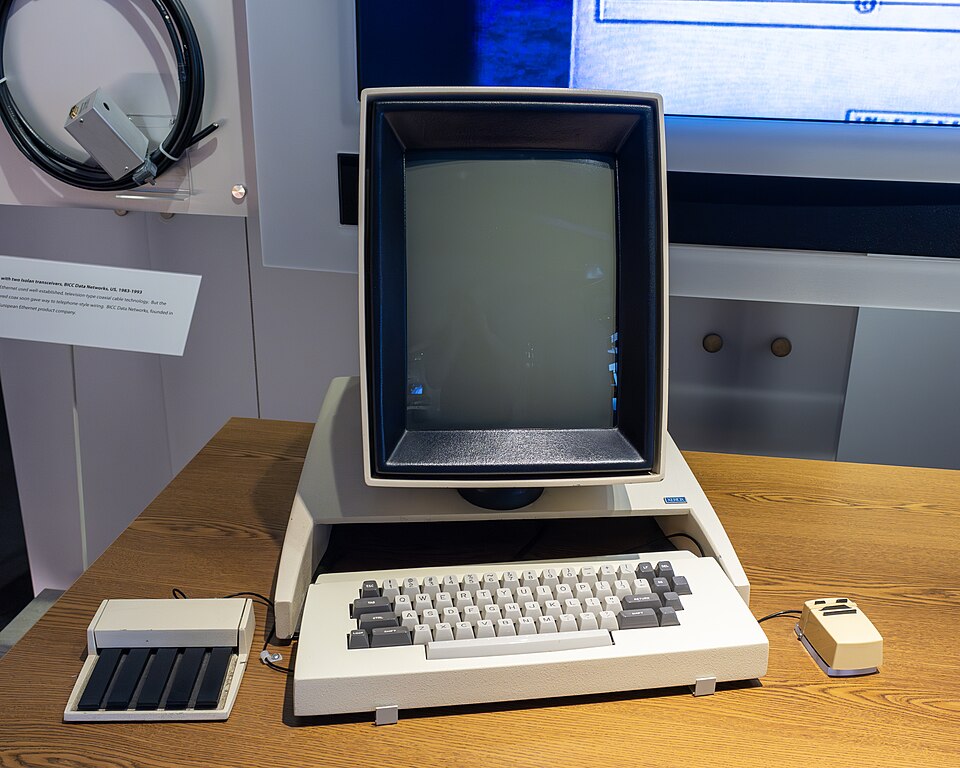A Xerox Alto computer with a portrait-orientation screen, keyboard and mouse.
